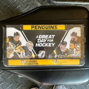 Penguins license plate cover